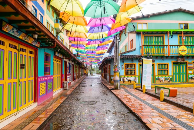 Rainbow umbrellas street in Guatapé
