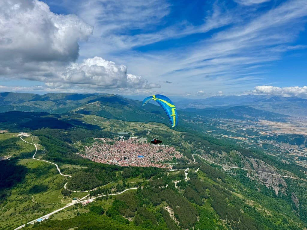 Pilot high above a mountain town